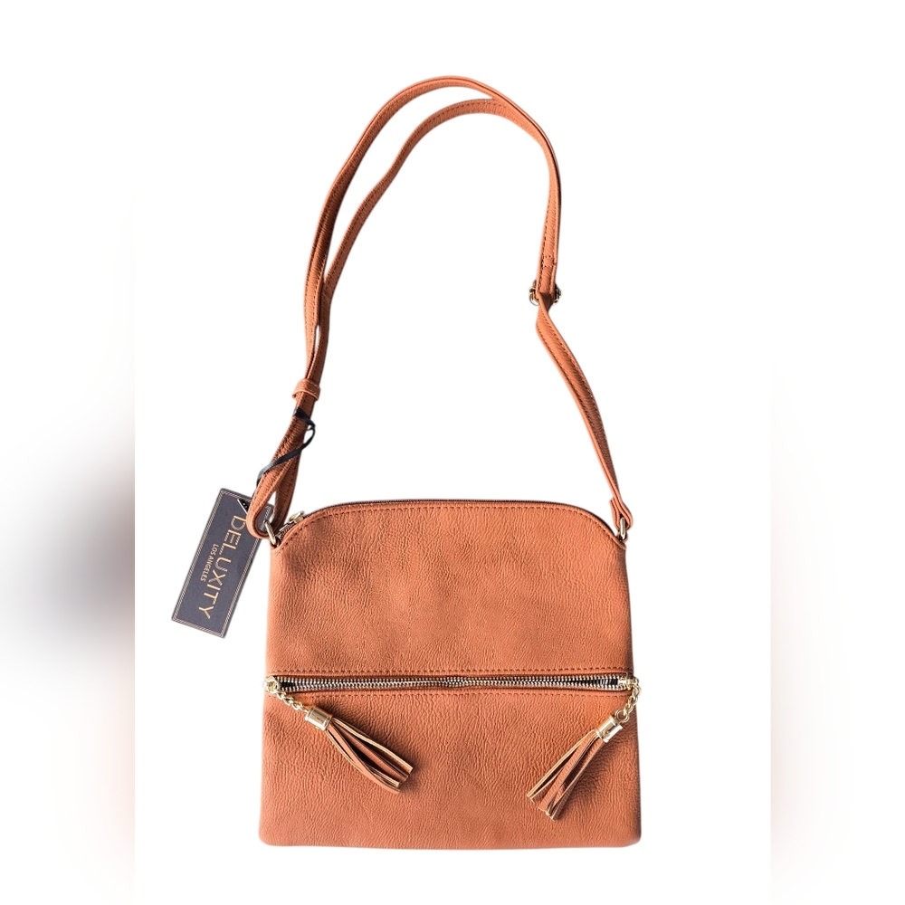 Tan Leather Crossbody Bag with Adjustable Strap and Modern Design